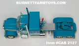 Item #CAB 2127 Turquoise White Stripe Silver Outline Peterbilt 379 48-inch Flattop Sleeper - 1/64 Scale – DCP by First Gear