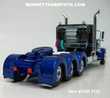 Item #CAB 2132 Black Blue Silver Outline Tri-Axle Peterbilt 389 36-inch Flattop Sleeper - 1/64 Scale – DCP by First Gear