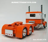Item #CAB 2179 Orange White Black Outline Peterbilt 389 36-inch Flattop Sleeper - 1/64 Scale – DCP by First Gear