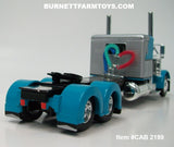 Item #CAB 2198 Turquoise Silver Black Outline Peterbilt 379 48-inch Flattop Sleeper - 1/64 Scale – DCP by First Gear