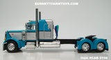 Item #CAB 2198 Turquoise Silver Black Outline Peterbilt 379 48-inch Flattop Sleeper - 1/64 Scale – DCP by First Gear