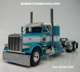 Item #CAB 2206 White Turquoise Peterbilt 379 36-inch Flattop Sleeper - 1/64 Scale – DCP by First Gear