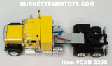 Item #CAB 2238 Yellow Black Fender GMC General 34-foot Flattop Sleeper - 1/64 Scale – DCP by First Gear