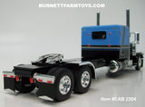 Item #CAB 2304 Baby Blue Black Silver Stripe Gold Outline Peterbilt 389 63-inch Flattop Sleeper - 1/64 Scale – DCP by First Gear