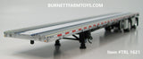 Item #TRL 1621 Chrome White Blue Black Deck Black Frame Spread Axle Wilson Roadbrute 53-foot Flatbed Trailer - 1/64 Scale - DCP by First Gear