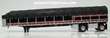 Item #TRL 2056 Black Viper Red Silver Sided Black Tarp Black Frame Spread Axle 53-foot Flatbed Covered Wagon Trailer - 1/64 Scale – DCP by First Gear