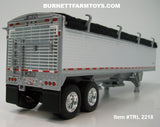 Item #TRL 2218 White Sided Black Tarp Silver Frame Wilson Pacesetter 34-foot Hopper Bottom Grain Trailer - 1/64 Scale – DCP by First Gear