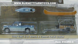 Item #32250-C Blue 1988 GMC S-15 Sierra Pickup Truck with Canoe Kayak and Trailer - 1/64 Scale - Greenlight - Hitch & Tow Series 25