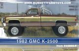 Item #44860-F Brown Gold 1982 GMC K-2500 Fall Guy Stuntman Association Pickup Truck - 1/64 Scale - Greenlight