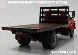 Item #60-0916 Orange GMC 6500 Flatbed Truck with Single Axle Wood Floor Black Frame Flatbed - 1/64 Scale - Note: Bed Does Not Tilt