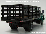 Item #60-0918 Green Chevrolet C65 Stake Truck with Single Axle Wood Floor Black Stake Bed - 1/64 Scale - Note: Bed Does Not Tilt