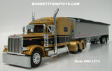 Item #60-1273 Gold Black Peterbilt 379 70-inch Mid Roof Sleeper with Silver Sided Black Tarp Silver Frame 50-foot Tri-Axle Wilson Pacesetter Hopper Bottom Grain Trailer - 1/64 Scale - DCP by First Gear