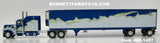 Item #60-1457 Blue Metallic White Silver Lime Green Outline Peterbilt 389 63-inch Mid Roof Sleeper with Spread Axle Utility Ribbed Refrigerator Trailer with Thermo King Refrigerator - 1/64 Scale - DCP by First Gear