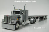 Item #60-1541 Silver Black Frame Long Frame Peterbilt 359 36-inch Flattop Sleeper with Silver Deck Black Frame Spread Axle Wilson Roadbrute Flatbed Trailer - 1/64 Scale - DCP by First Gear