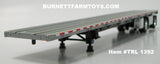 Item #TRL 1392 Silver Deck Black Frame Spread Axle Wilson Roadbrute Flatbed Trailer - 1/64 Scale - DCP by First Gear